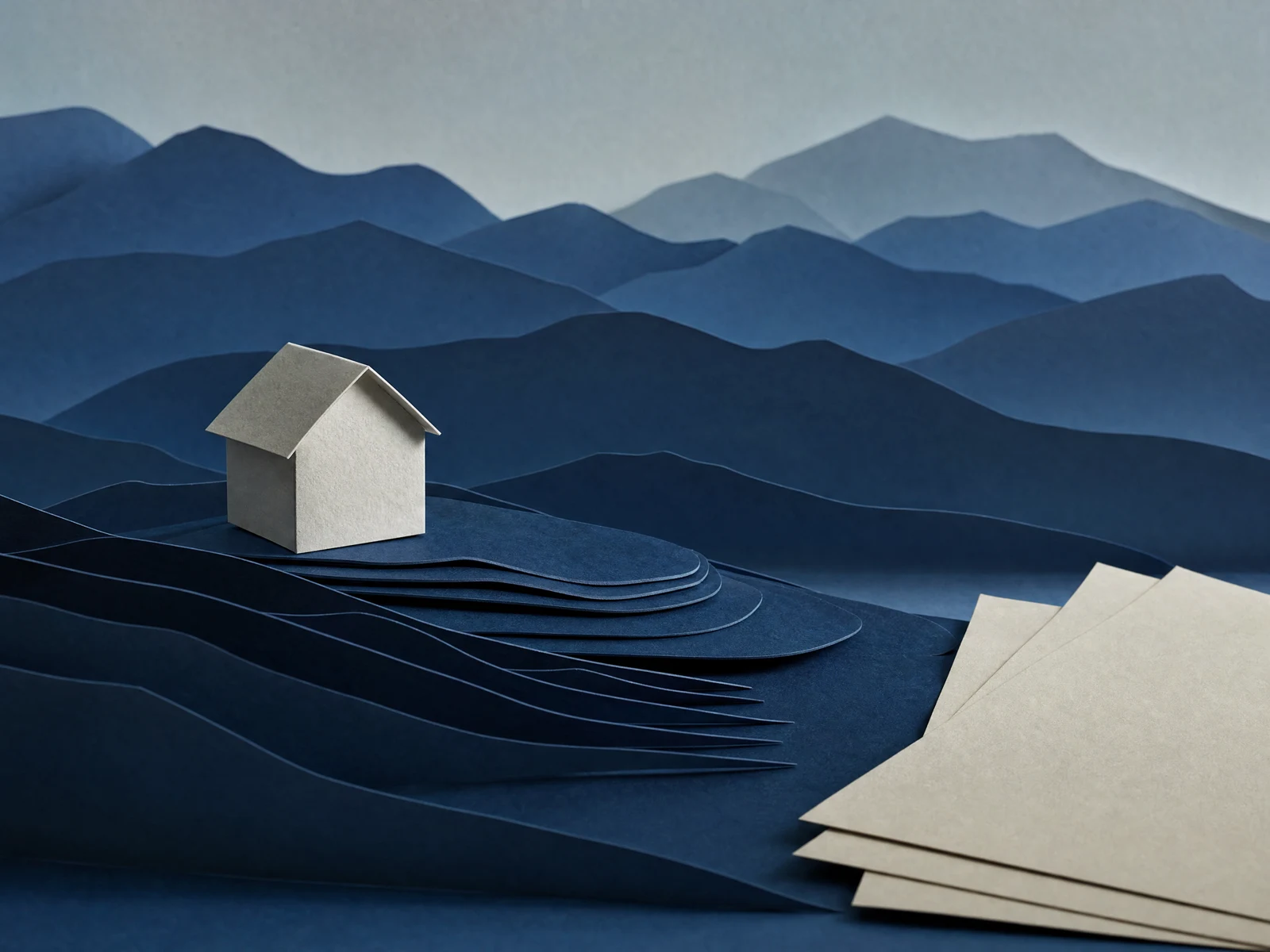 Illustration of layered Washington ridgelines behind a home